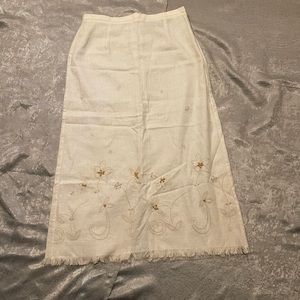 Requirement petite white skirt with wooden embellishments